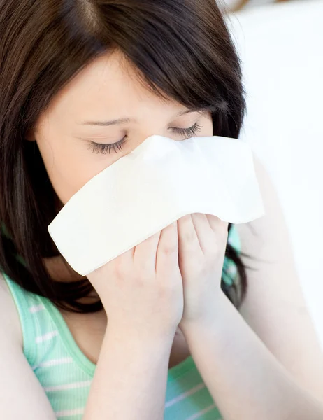 Portrait of a sick tired teen girl blowing — Stock Photo, Image