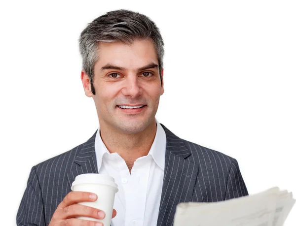 Attractive businessman reading a newspaper — Stock Photo, Image