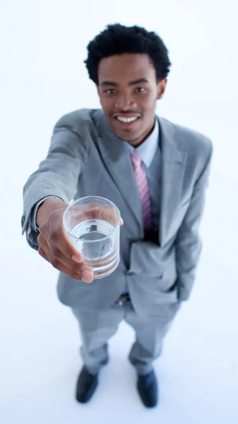 Afro-American businessman holding a glass of water — Stock Photo, Image