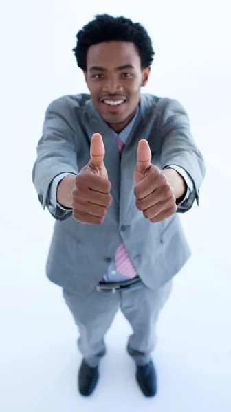 Афро-американский бизнесмен с большими пальцами вверх — стоковое фото