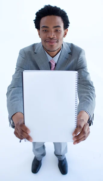 Biznesmen posiadający duży notebook — Zdjęcie stockowe