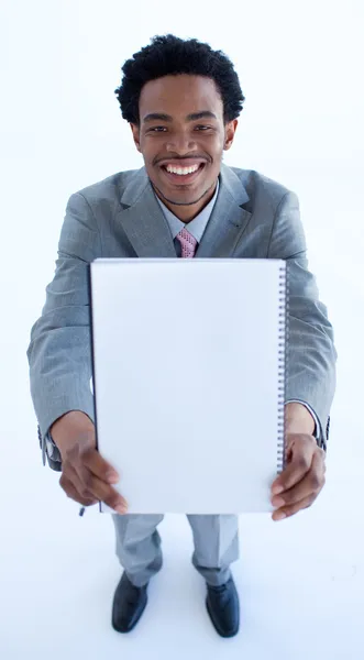 Empresário afro-americano segurando um grande caderno — Fotografia de Stock