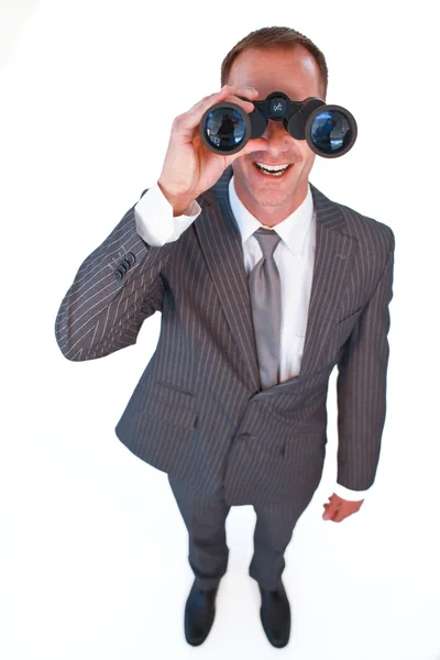 High angle of a businessman looking through binoculars — Stock Photo, Image
