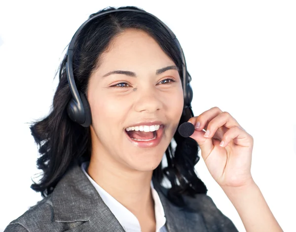 A fülhallgatóval a mosolygó üzletasszony — Stock Fotó
