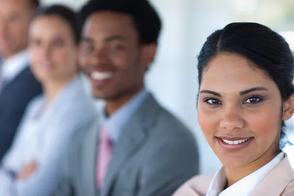 Beautiful businesswoman with her team in a line — Stock Photo, Image