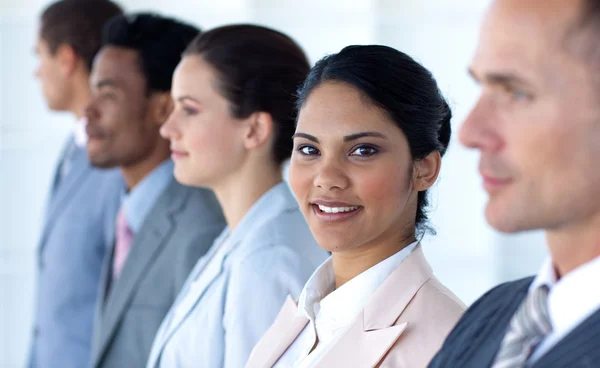 Confident businesswoman with her team in a line — Stock Photo, Image