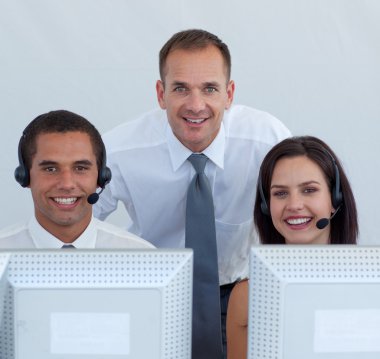 Manager and business team in a call canter clipart