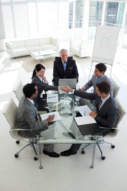 Man and woman greeting each other in a meeting clipart