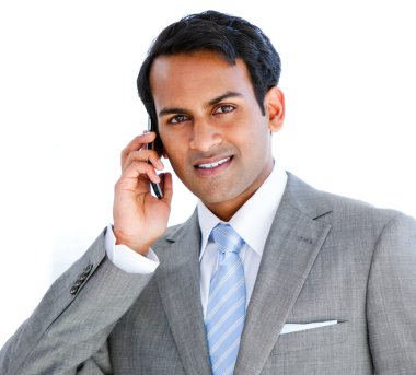 Portrait of a businessman taking a phone call clipart