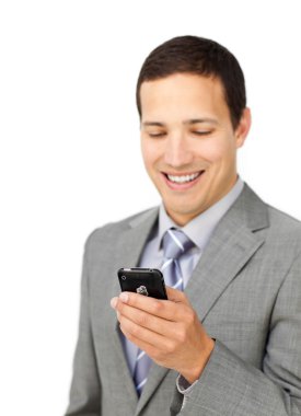 Self-assured male executive using a mobile phone clipart