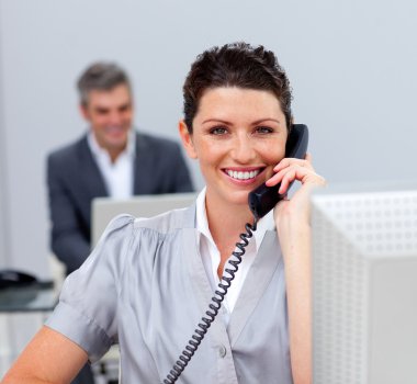 Pretty business woman on phone clipart