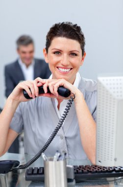 Brunette business woman on phone clipart