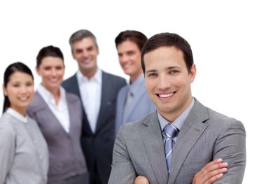 Smiling businessman with folded arms standing with his team clipart