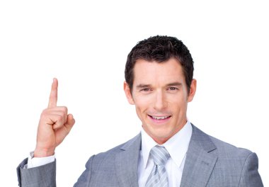 Confident businessman pointing upward clipart