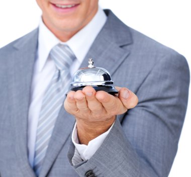 Close-up of a businessman holding a service bell clipart