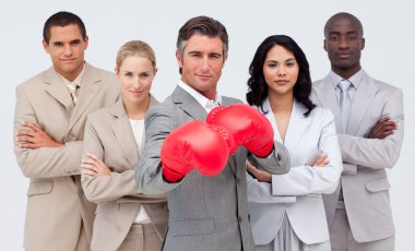 Confident businessman boxing and leading his team clipart