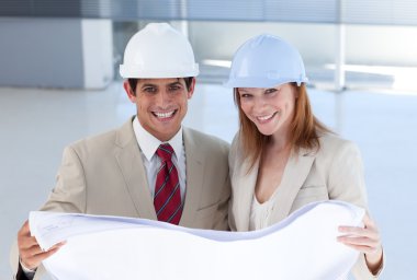 Two engeneers disscussing a construction project clipart