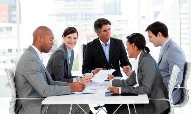 businesspeople disscussing a budget plan clipart