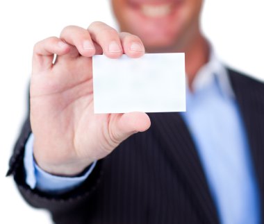 Close-up of a businessman holding a white card clipart