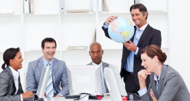 A meeting of a lucky business team about globalization clipart