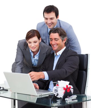 Enthusiastic business team working at a computer clipart