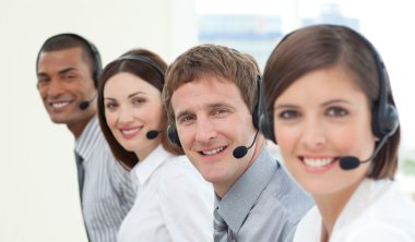 Smiling customer service agents with headset on clipart