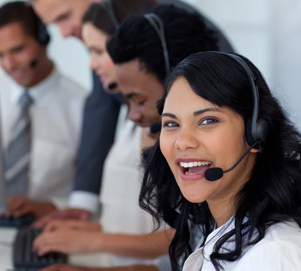 Portrait of a smiling businesswoman in a call center — Stock Photo, Image