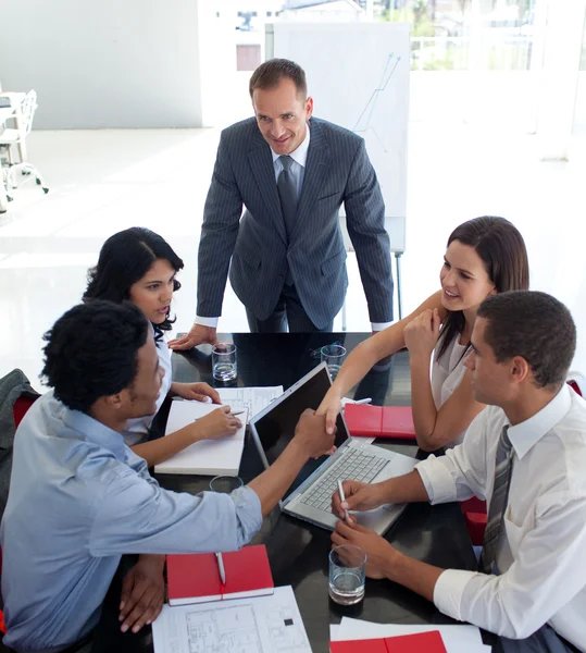 Business shaking hands in a meeting — Stock Photo, Image