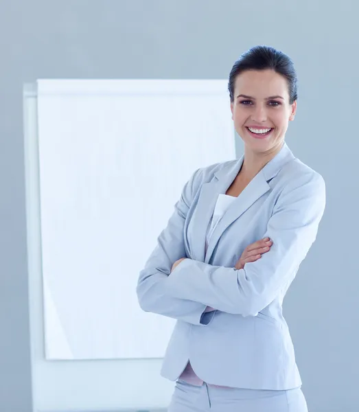 Friendly businesswoman giving a presentation — Stock Photo, Image