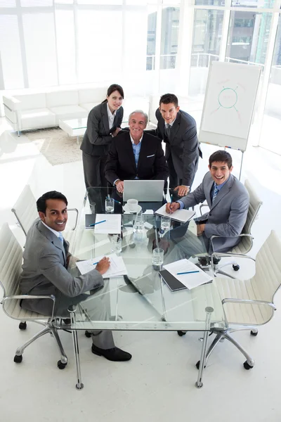 A diverse business team smiling at the camera — Stock Photo, Image