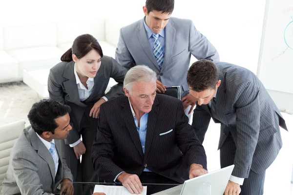 Concentrated business team working at a computer — Stock Photo, Image