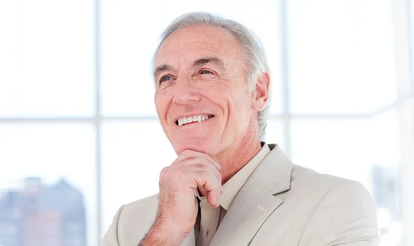 Close-up of a senior businessman smiling — Stock Photo, Image