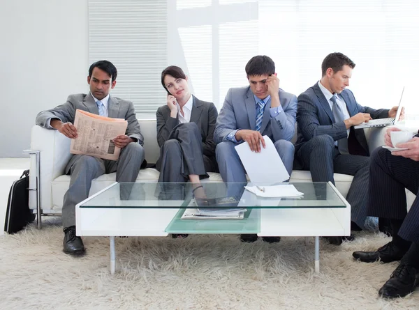 International business sitting in a waiting room — Stock Photo, Image