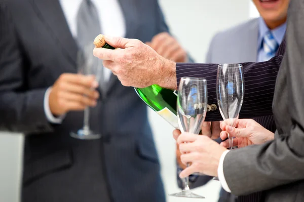 stock image Close-up of a business man opening a bottle of Champagne