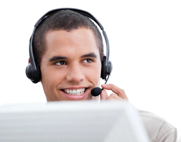 Attractive businessman with headset on working — Stock Photo, Image