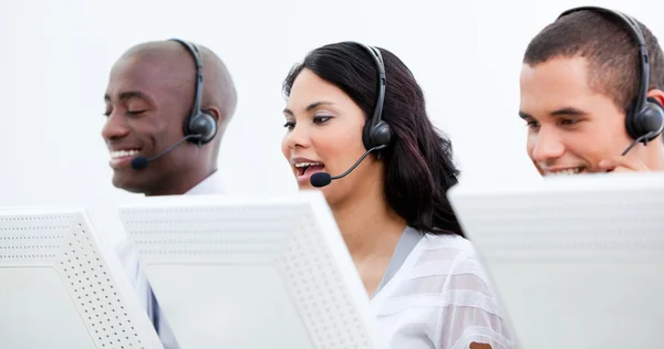 Multi-ethnic busines team working in a call center — Stock Photo, Image