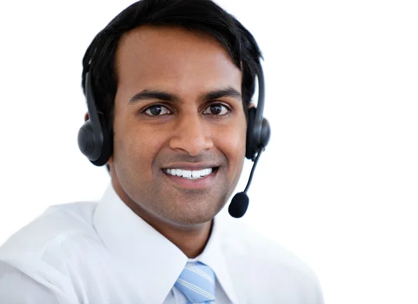 Homem representante de vendas positivas com um fone de ouvido — Fotografia de Stock