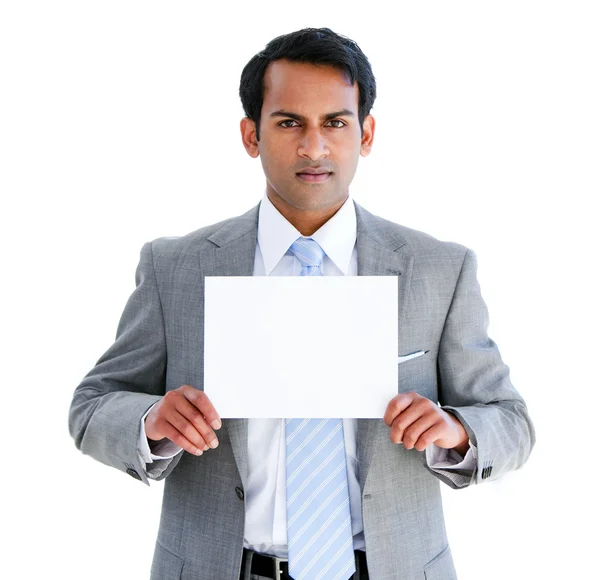 Confident businessman showing a note — Stock Photo, Image
