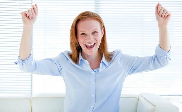 Nice business woman punching the air — Stock Photo, Image