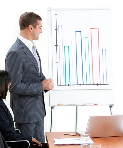 Attractive young businessman doing a presentation — Stock Photo, Image