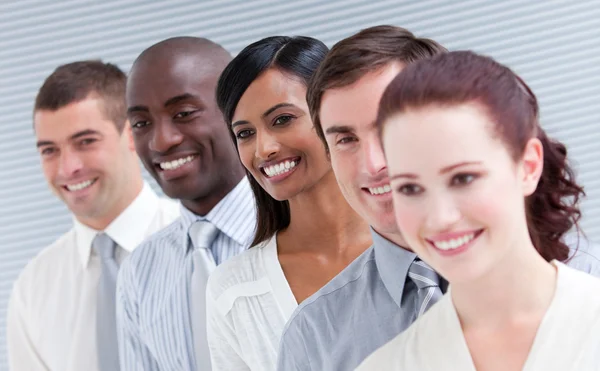 Multi-ethnic young business team standing in a row — Stock Photo, Image