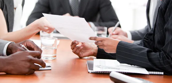 stock image Close-up of multi-ethnic business in a meeting