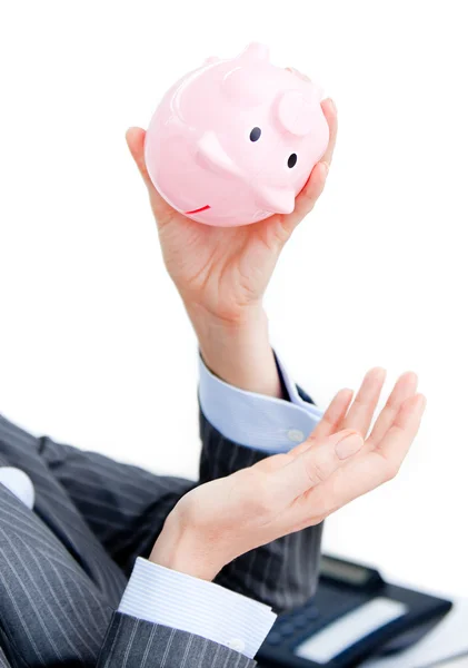 Close-up of a businesswoman holding a piggy-bank — Stock Photo, Image