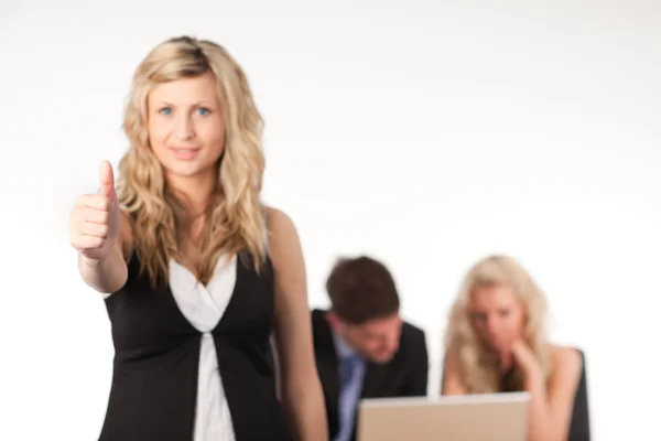 Businesswoman with her thumb up to camera — Stock Photo, Image