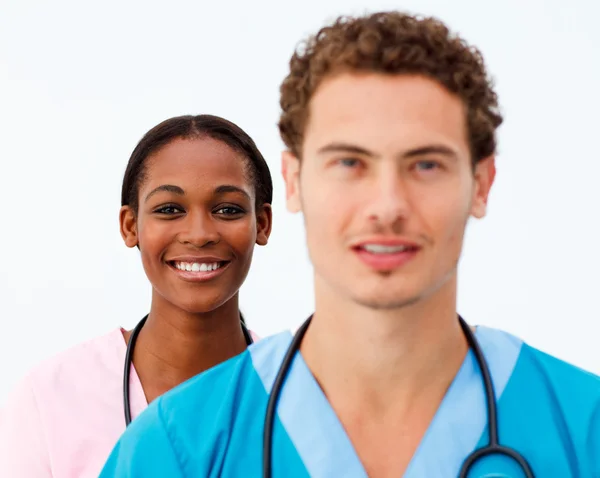 Ritratto di due medici positivi su sfondo bianco — Foto Stock