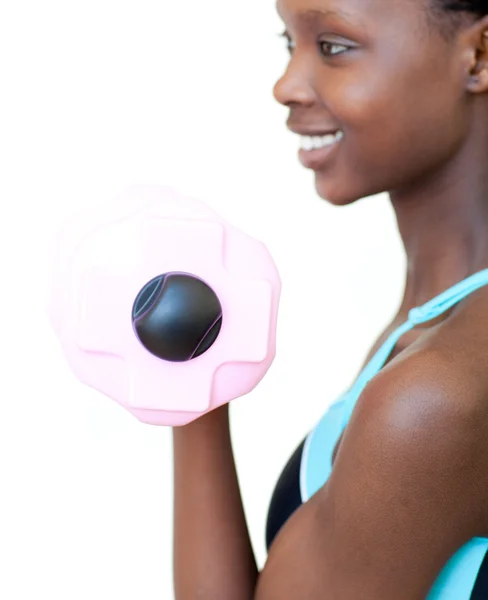 Jolly woman working out with dumbbell — Stock Photo, Image