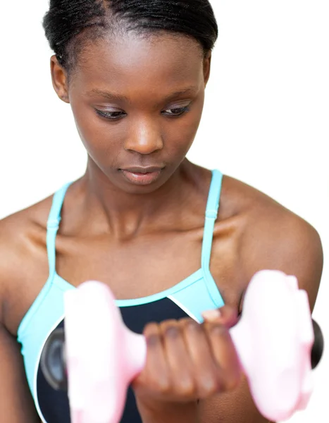 Serious woman working out with dumbbell — Stock Photo, Image