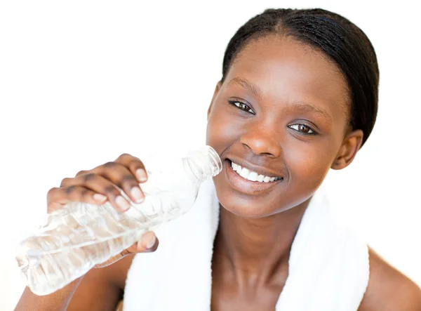 Happy fitness woman drinking water — Stock Photo, Image