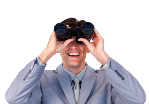 Enthusiastic businessman looking through binoculars — Stock Photo, Image