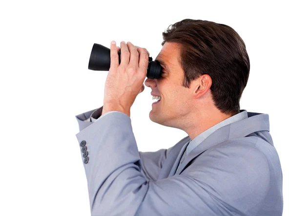 Happy businessman using binoculars — Stock Photo, Image